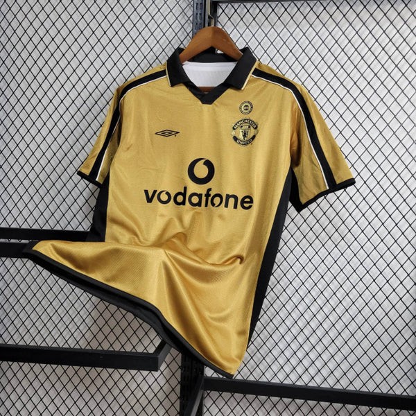 Camisa Manchester United RETRÔ DUPLA FACE 2001/02 Branca e dourada