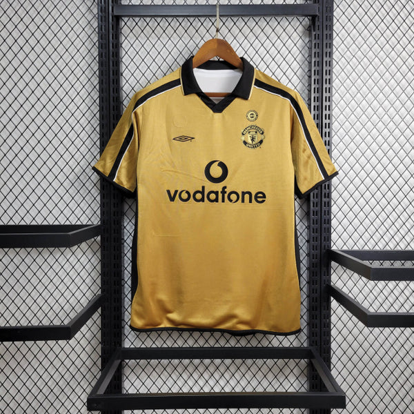 Camisa Manchester United RETRÔ DUPLA FACE 2001/02 Branca e dourada